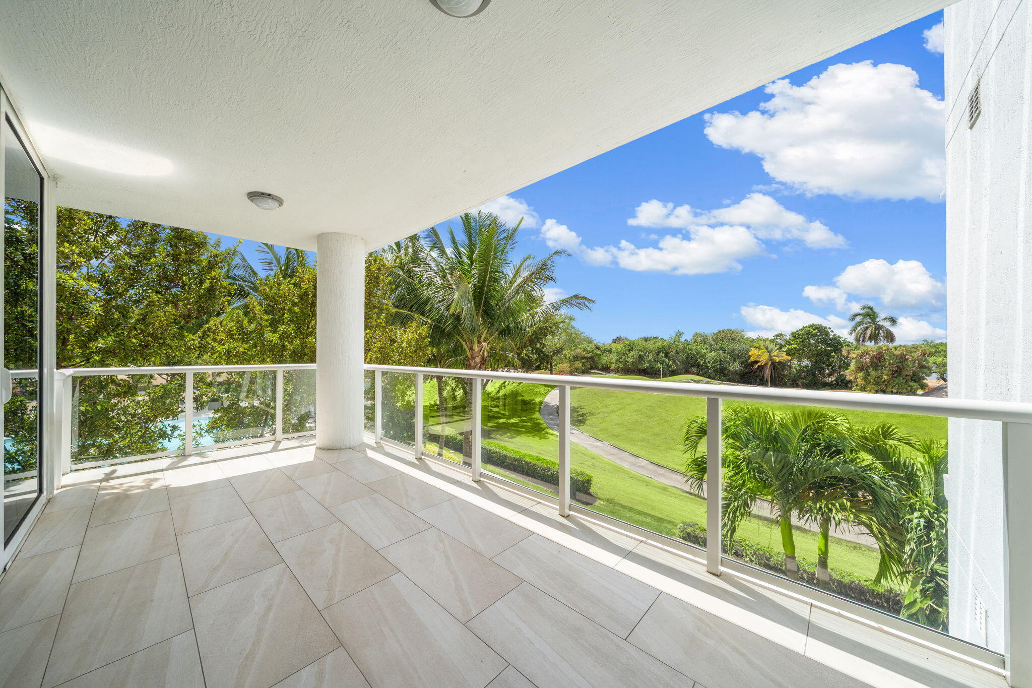 20155 Boca W Drive, Unit C201 Boca Raton, FL 33434 - Photo 5 of 42 a view of balcony with furniture
