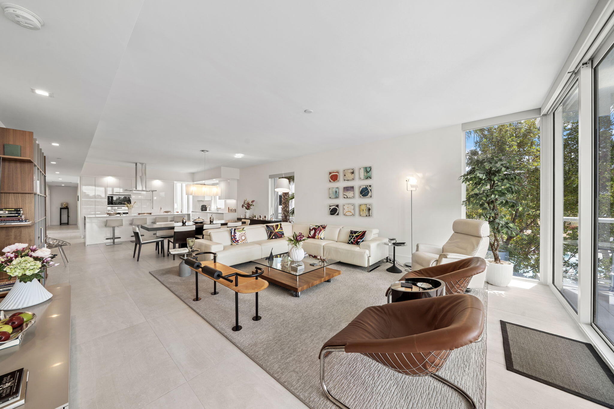 20155 Boca W Drive, Unit C201 Boca Raton, FL 33434 - Photo 6 of 42 a living room with lots of furniture and a large window
