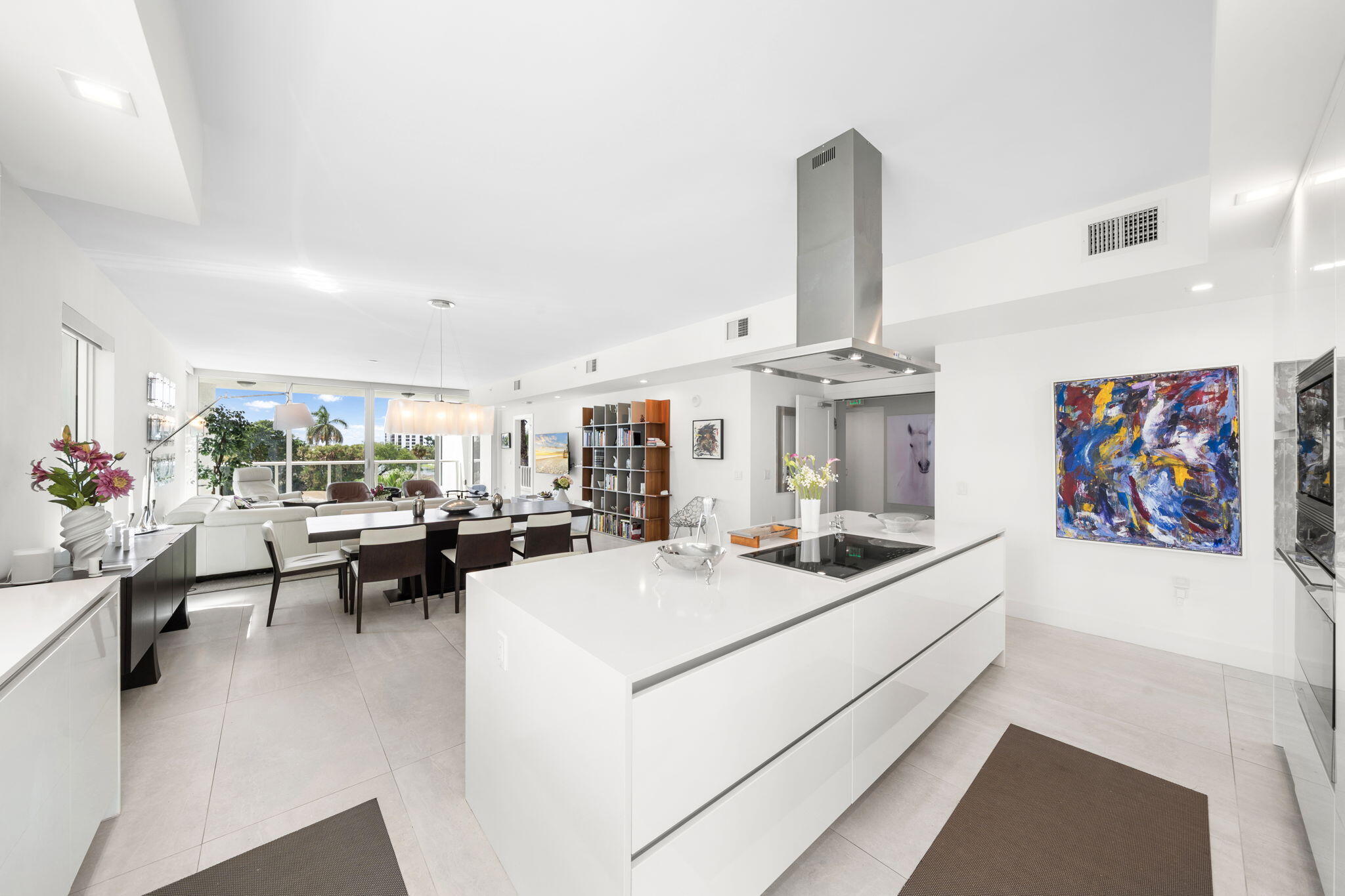 20155 Boca W Drive, Unit C201 Boca Raton, FL 33434 - Photo 9 of 42 a living room with furniture and kitchen view