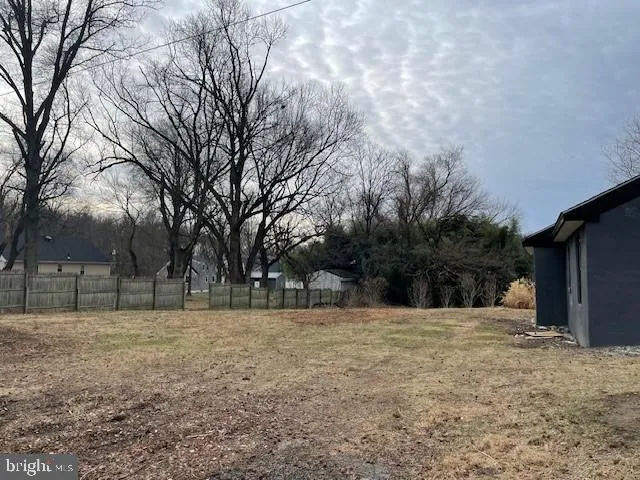 a house with trees in back yard