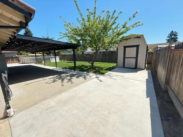 a garden view with a seating space