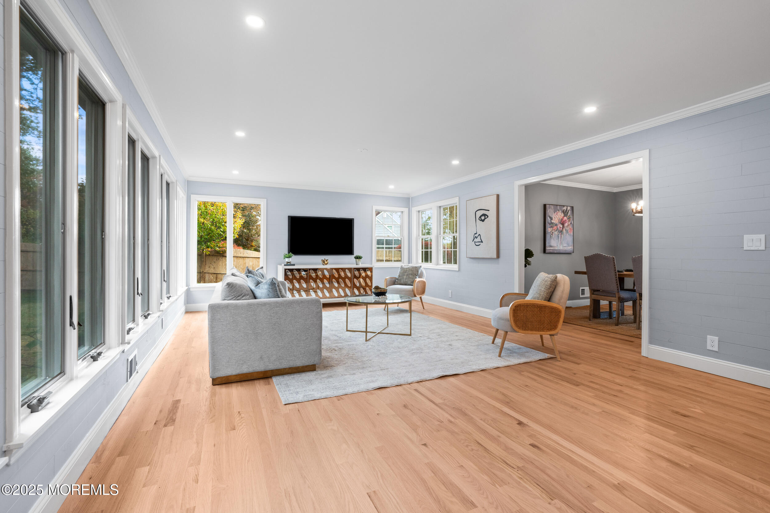 3412 Brandon Road Belmar, NJ 07719 - Photo 14 of 48 a living room with furniture and a flat screen tv