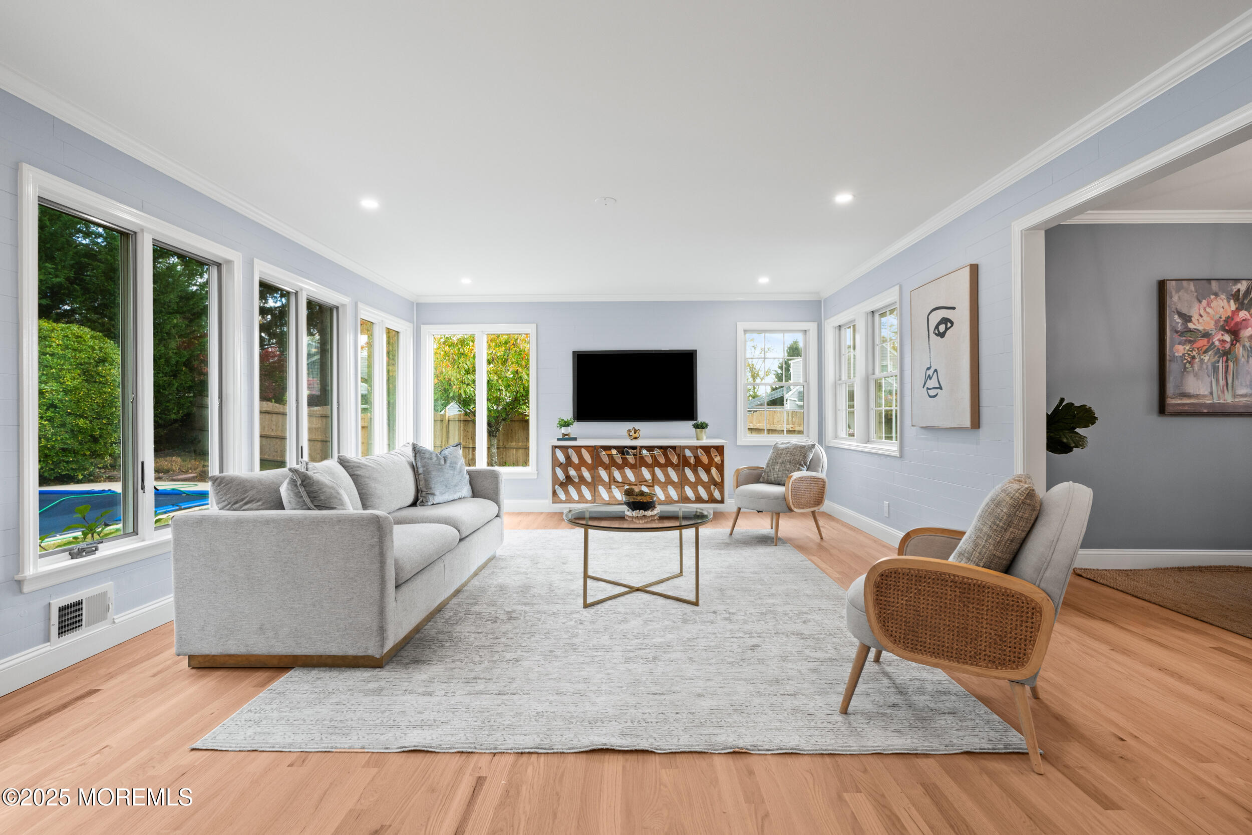 3412 Brandon Road Belmar, NJ 07719 - Photo 15 of 48 a living room with furniture and a flat screen tv