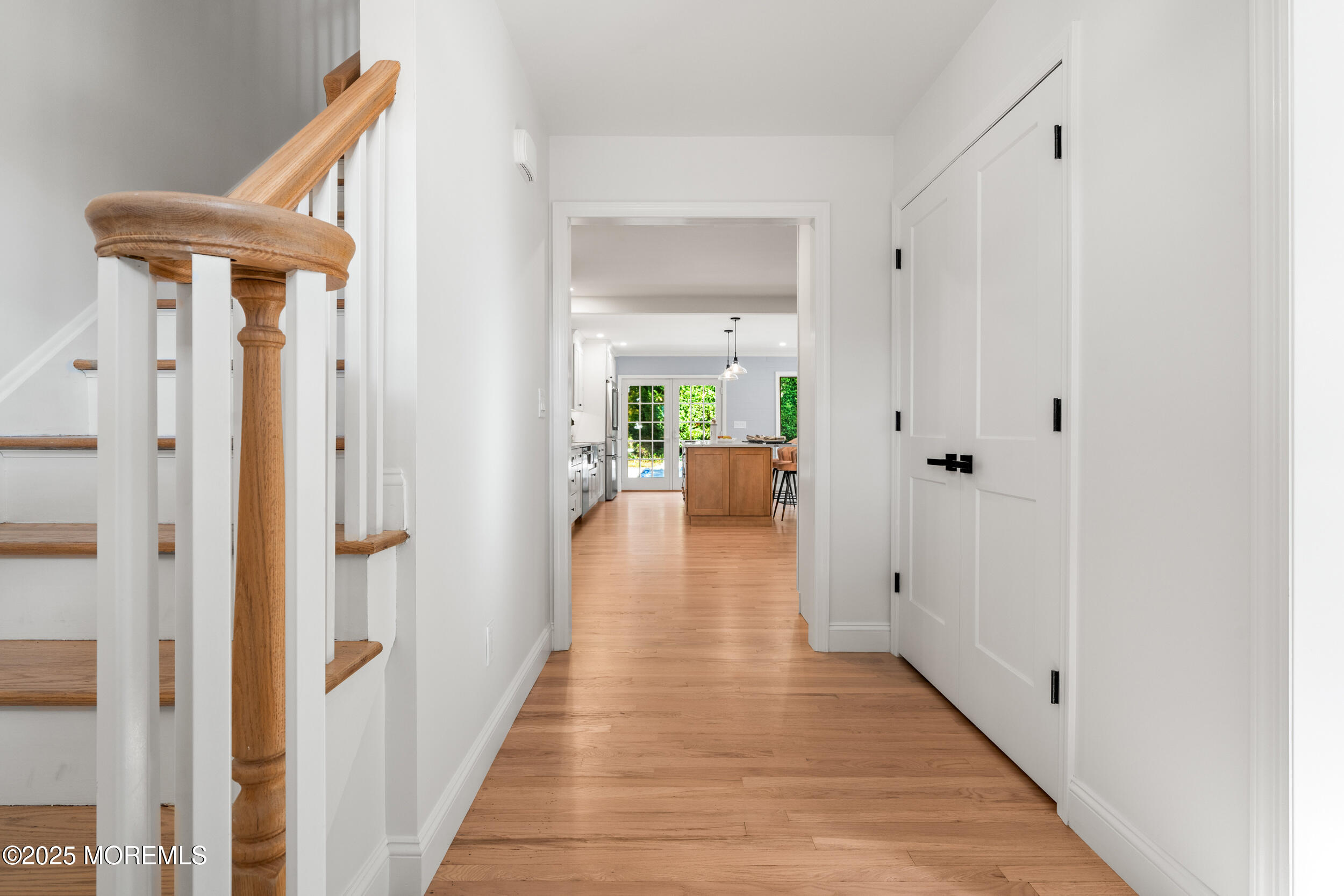 3412 Brandon Road Belmar, NJ 07719 - Photo 2 of 48 a view of a hallway with wooden floor and a living room