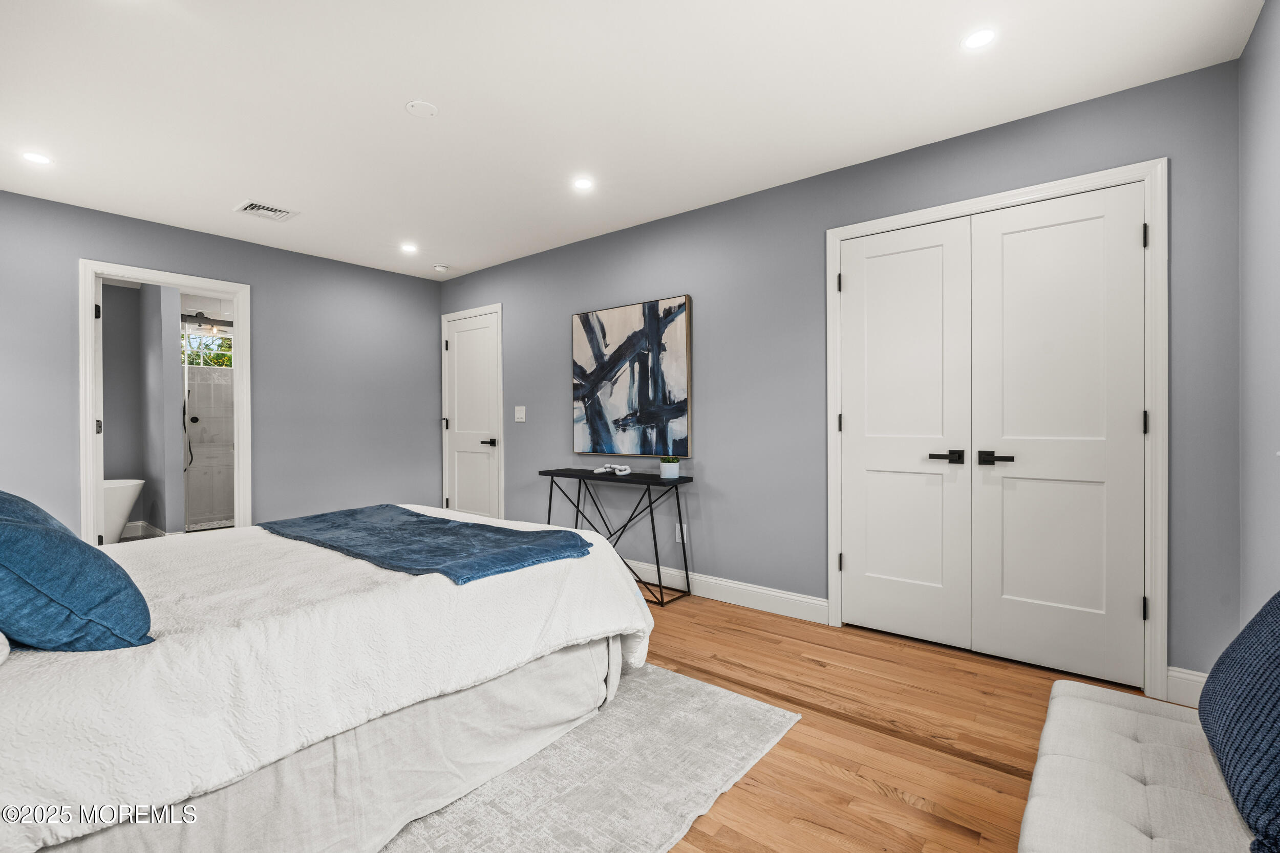 3412 Brandon Road Belmar, NJ 07719 - Photo 23 of 48 a bedroom with a bed and a table