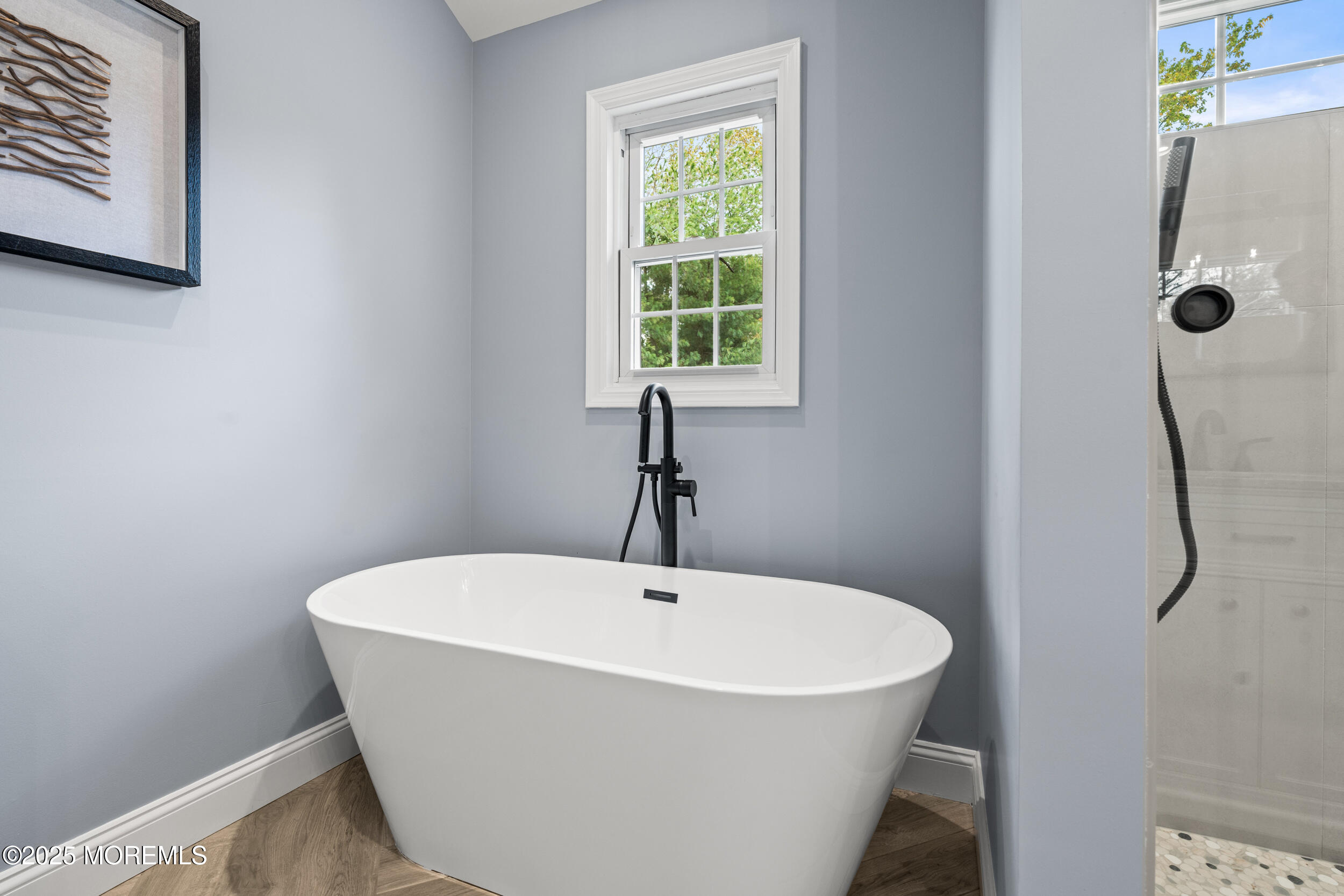 3412 Brandon Road Belmar, NJ 07719 - Photo 24 of 48 a white bath tub sitting in a bathroom