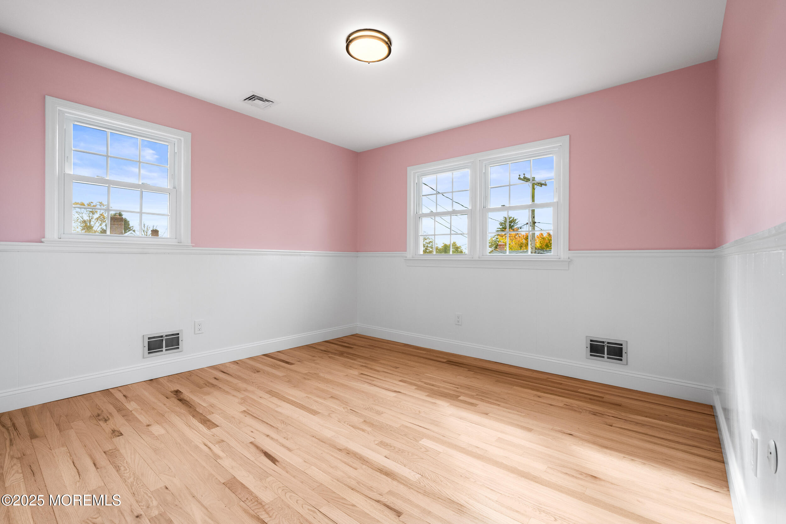 3412 Brandon Road Belmar, NJ 07719 - Photo 32 of 48 a view of empty room with window and wooden floor