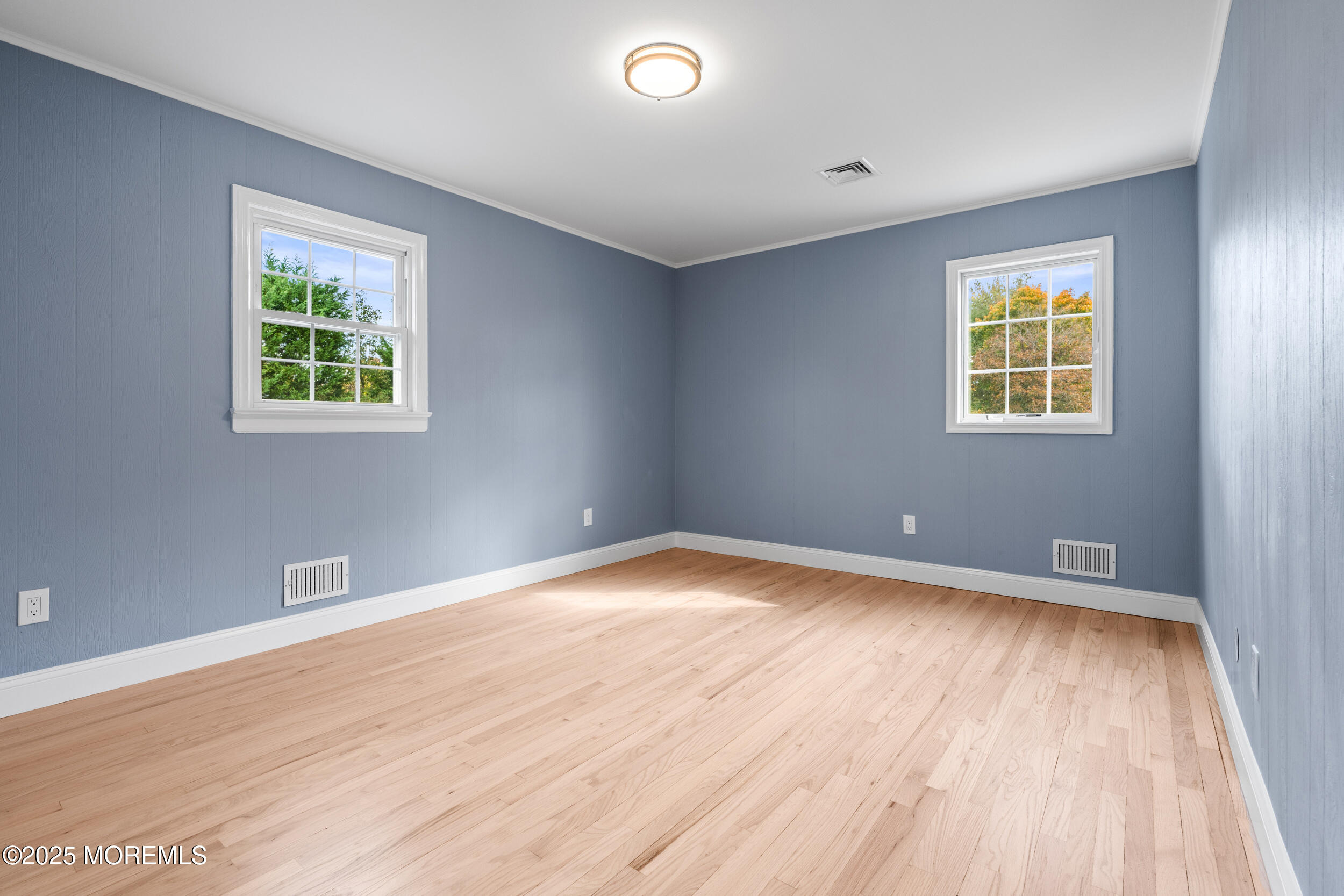3412 Brandon Road Belmar, NJ 07719 - Photo 33 of 48 a view of an empty room with wooden floor and a window