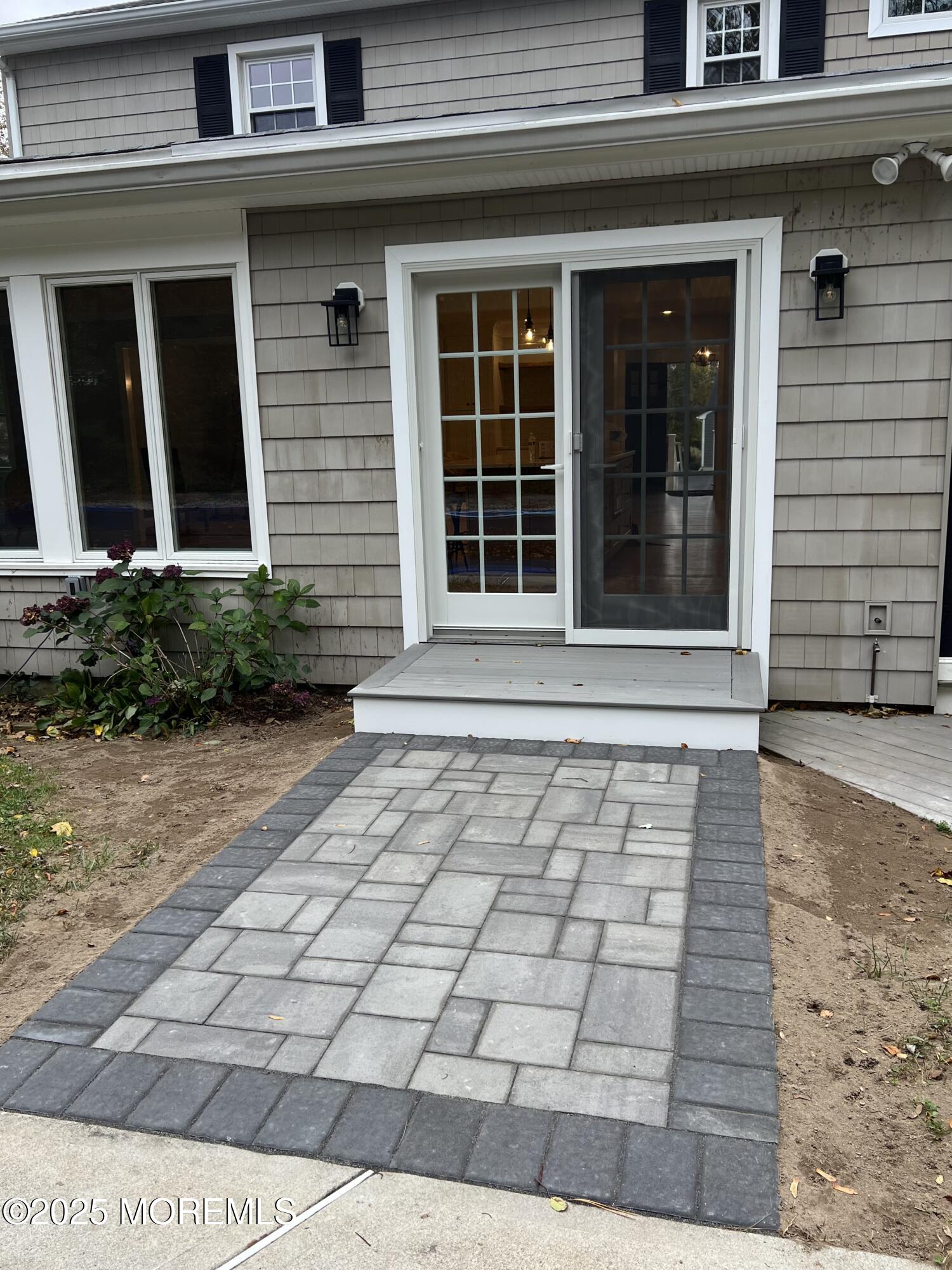 3412 Brandon Road Belmar, NJ 07719 - Photo 40 of 48 a view of a brick house with a window