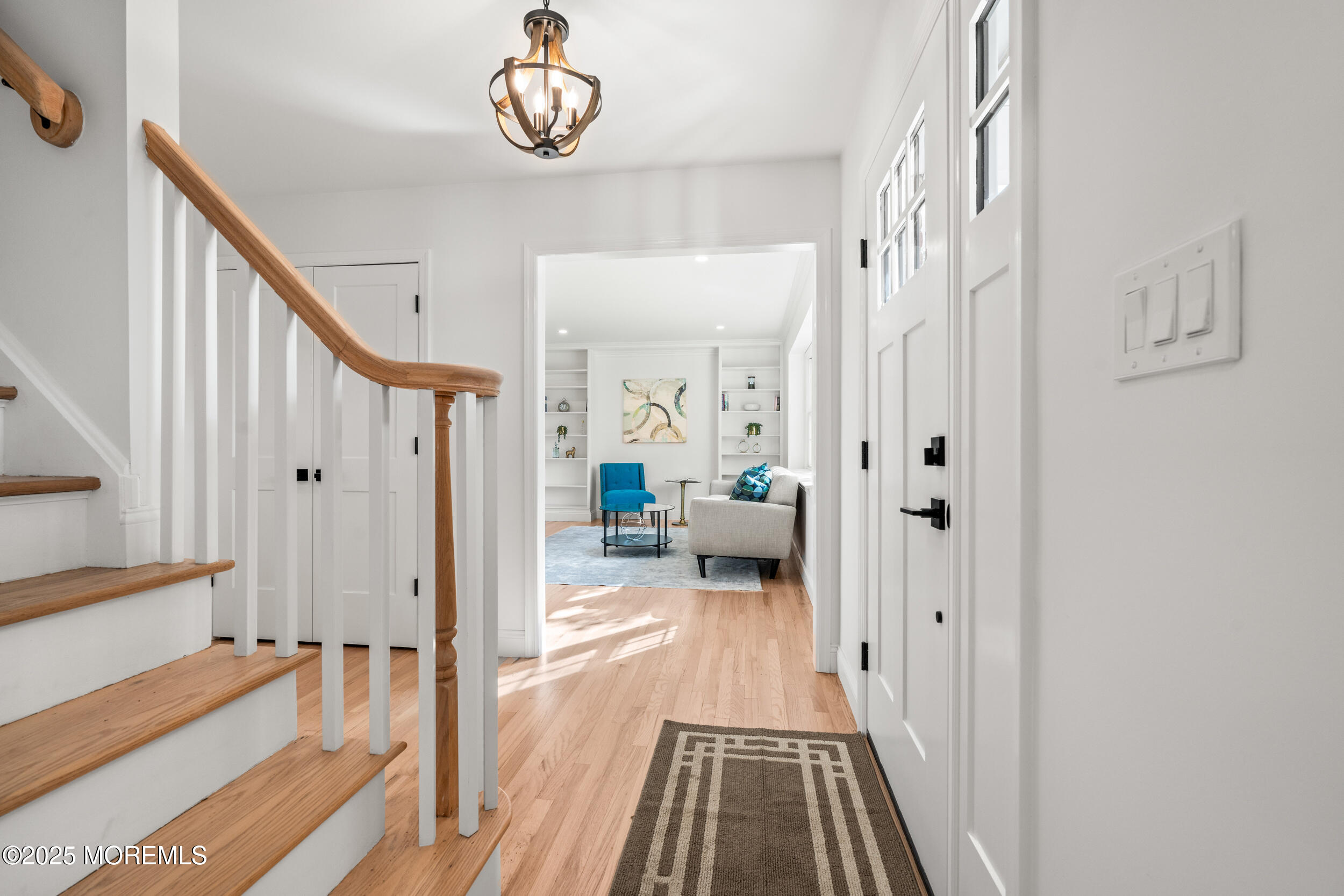 3412 Brandon Road Belmar, NJ 07719 - Photo 4 of 48 a view of a hallway with a livingroom and furniture