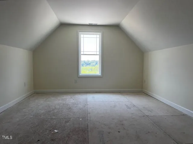 a house with yard in front of it