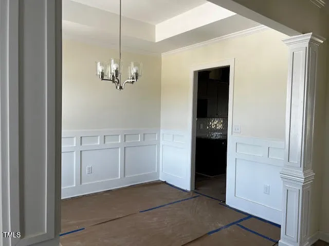 a view of a hallway with wooden shelves