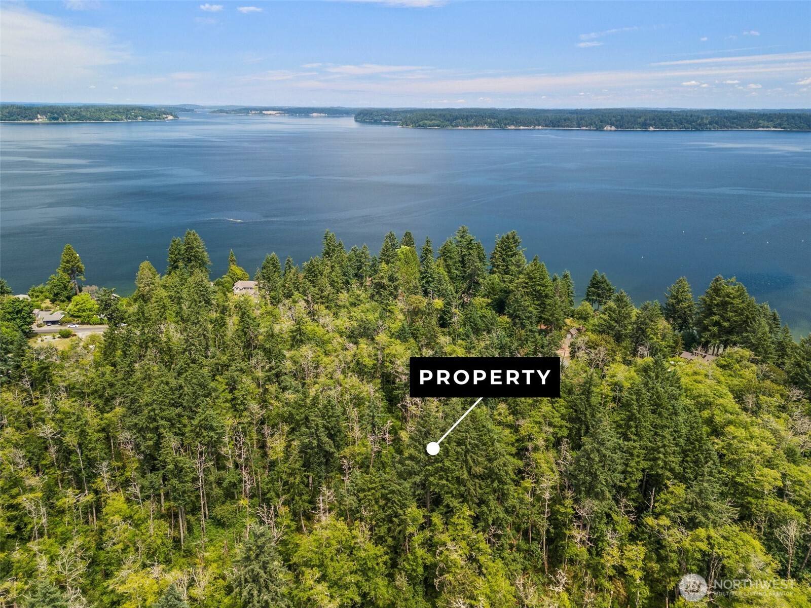 7605 Sandy Point Road Northeast Olympia, WA 98516 - Photo 14 of 25 a view of a street with an ocean view