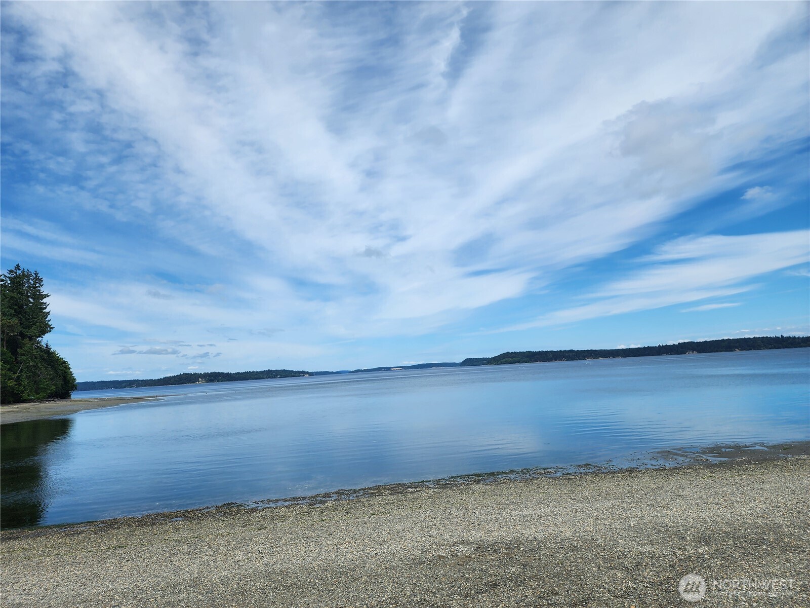 7605 Sandy Point Road Northeast Olympia, WA 98516 - Photo 24 of 25 a view of an ocean beach