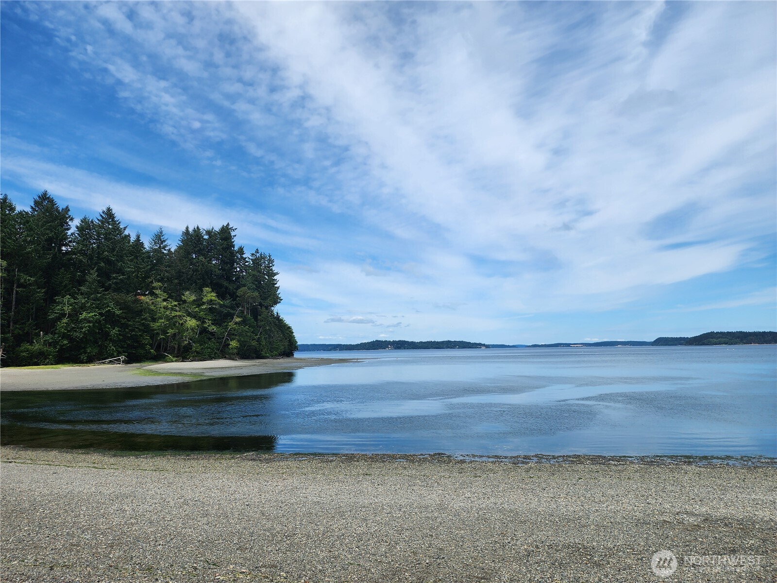 7605 Sandy Point Road Northeast Olympia, WA 98516 - Photo 25 of 25 a view of yard with mountain in background