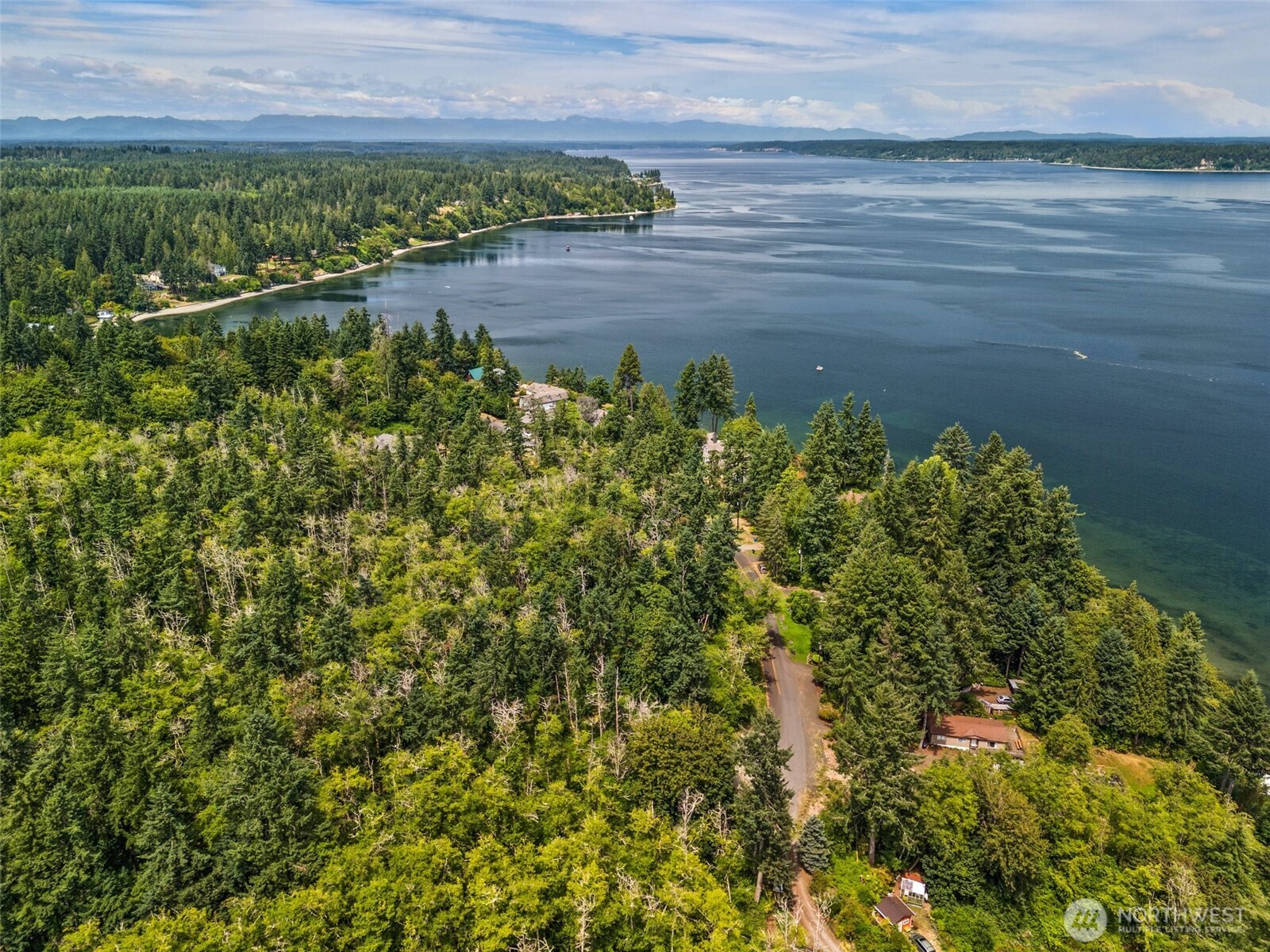 7605 Sandy Point Road Northeast Olympia, WA 98516 - Photo 5 of 25 a view of a lake view