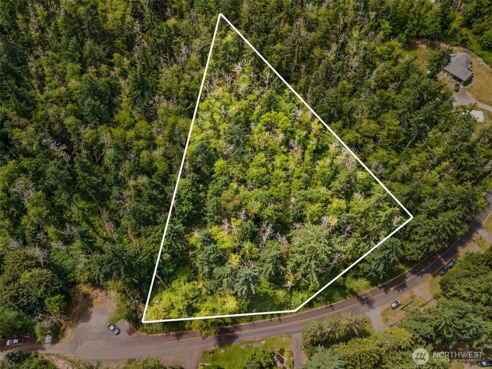 7605 Sandy Point Road Northeast Olympia, WA 98516 - Photo 10 of 25 a view of a tennis court