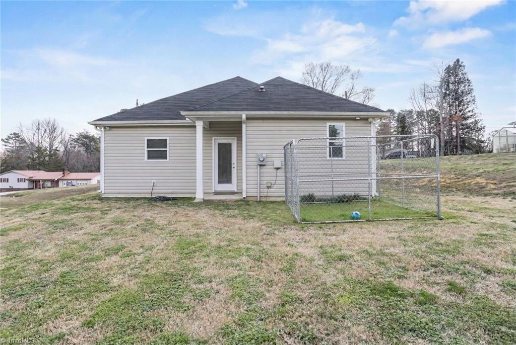 444 Weatherly Street Ramseur, NC 27316 - Photo 23 of 23 back of home with storage closet