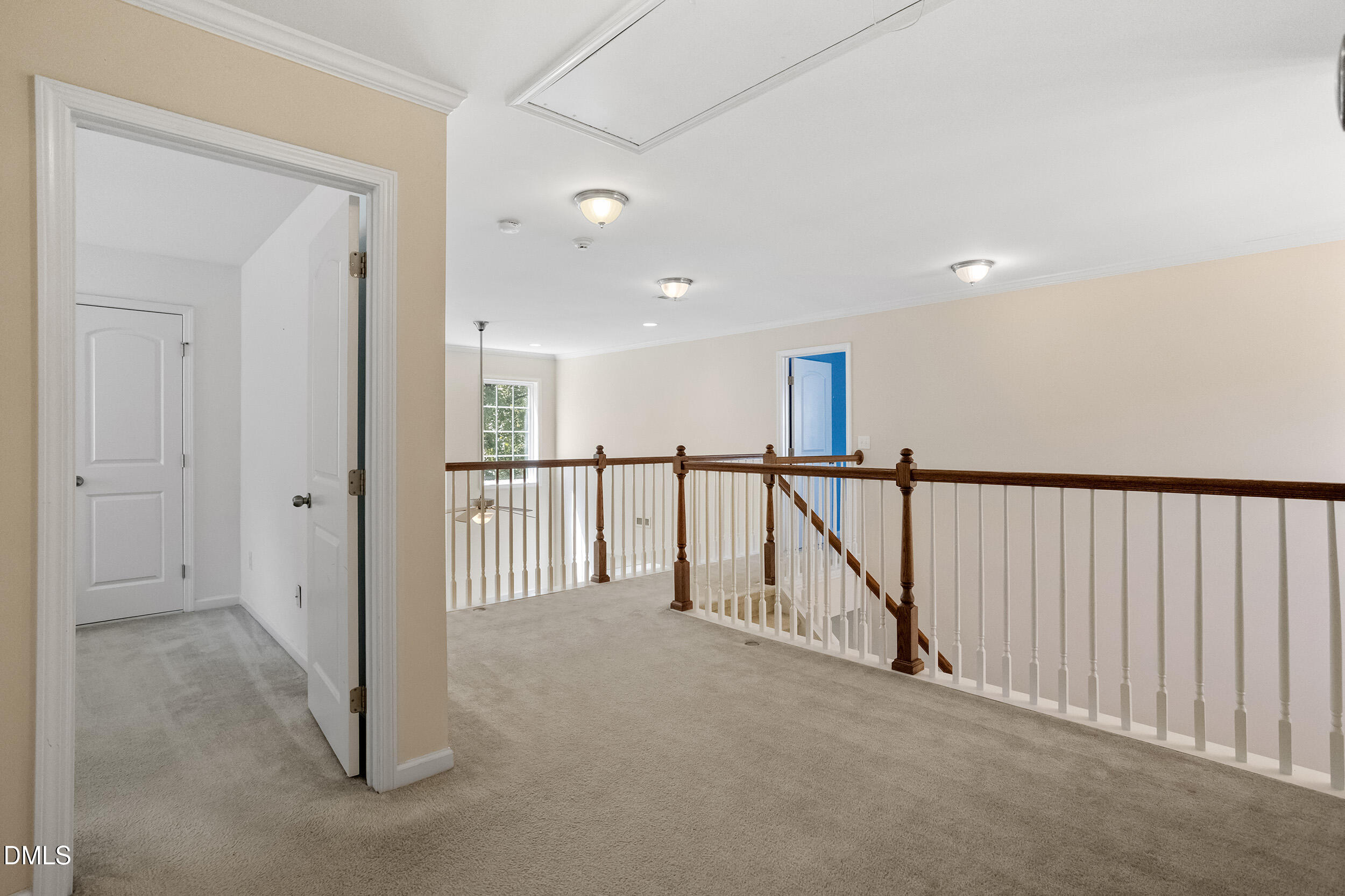 235 Strolling Way Durham, NC 27707 - Photo 31 of 32 a view of staircase with wooden floor and windows