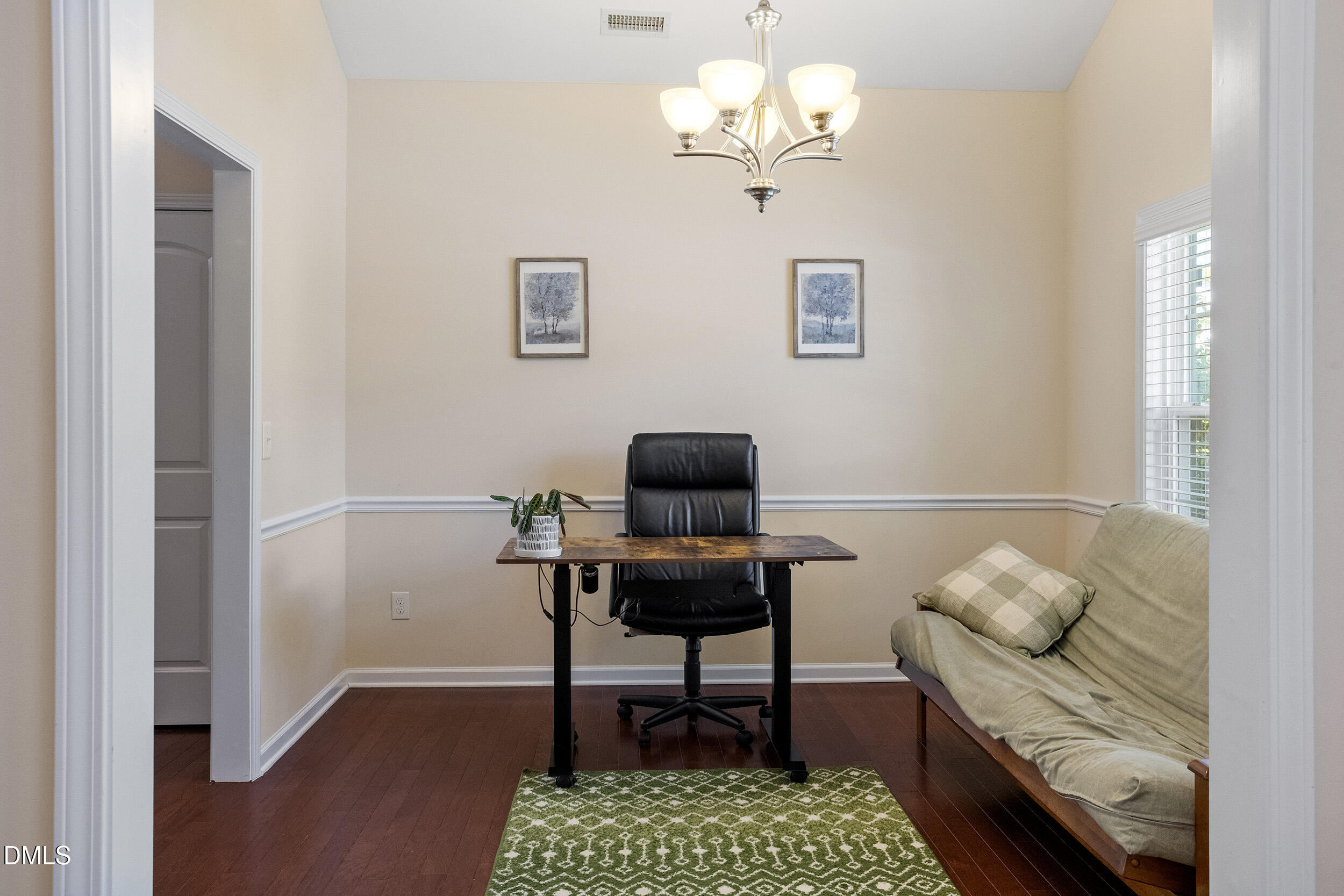 235 Strolling Way Durham, NC 27707 - Photo 9 of 32 a workspace with furniture and a window