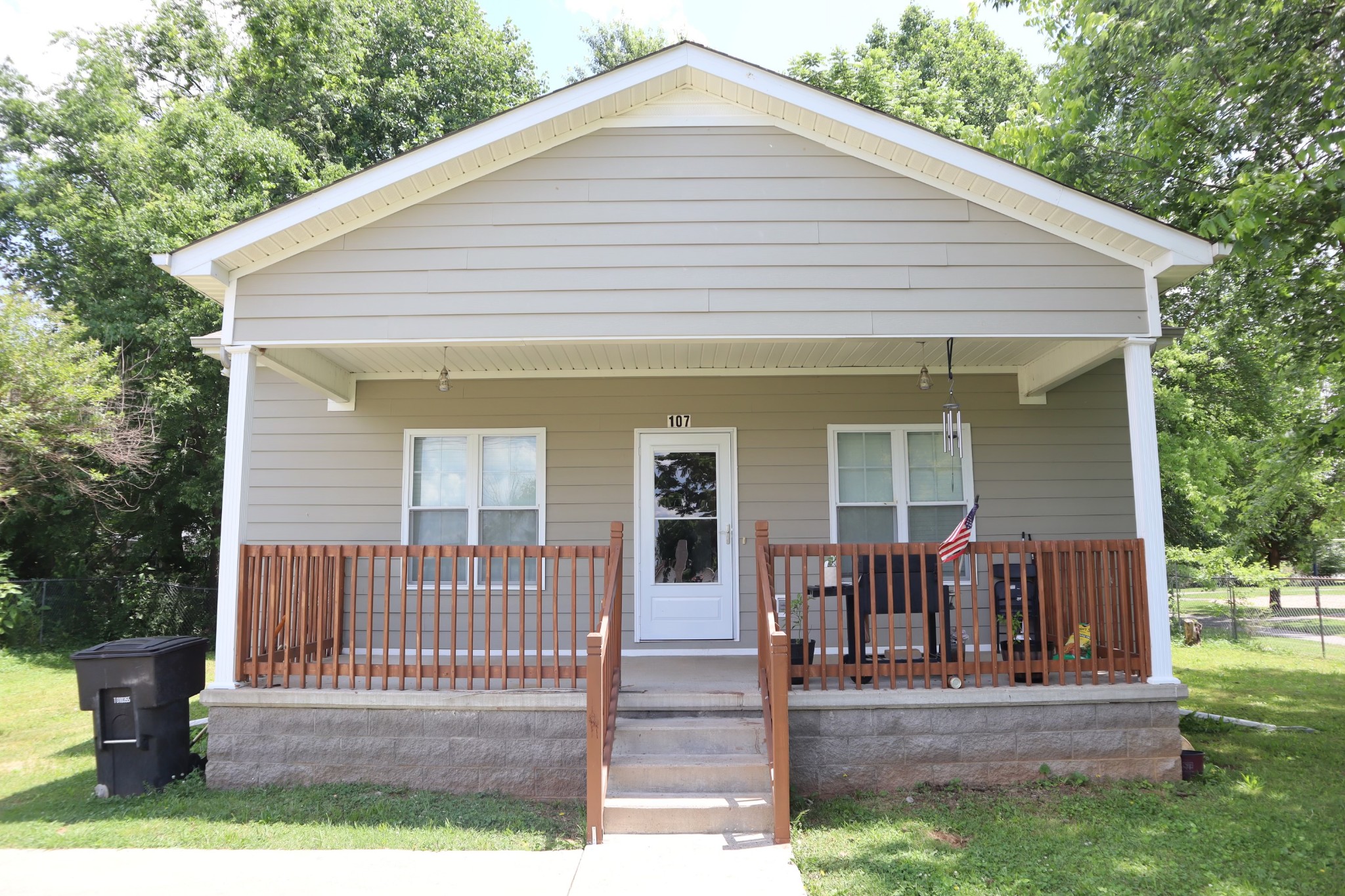 107 February Street Murfreesboro, TN 37129 - Photo 2 of 19 a front view of a house with garden