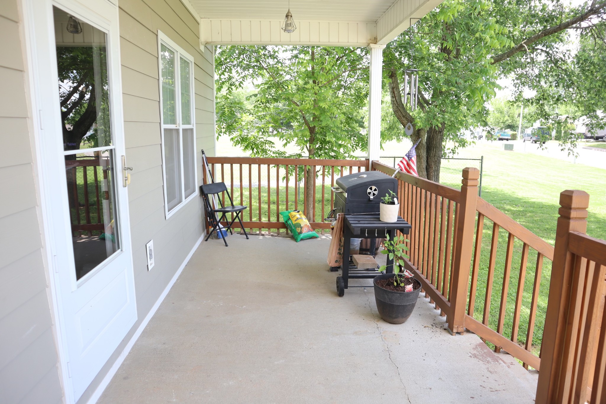 107 February Street Murfreesboro, TN 37129 - Photo 3 of 19 a view of a porch with furniture and floor to ceiling window