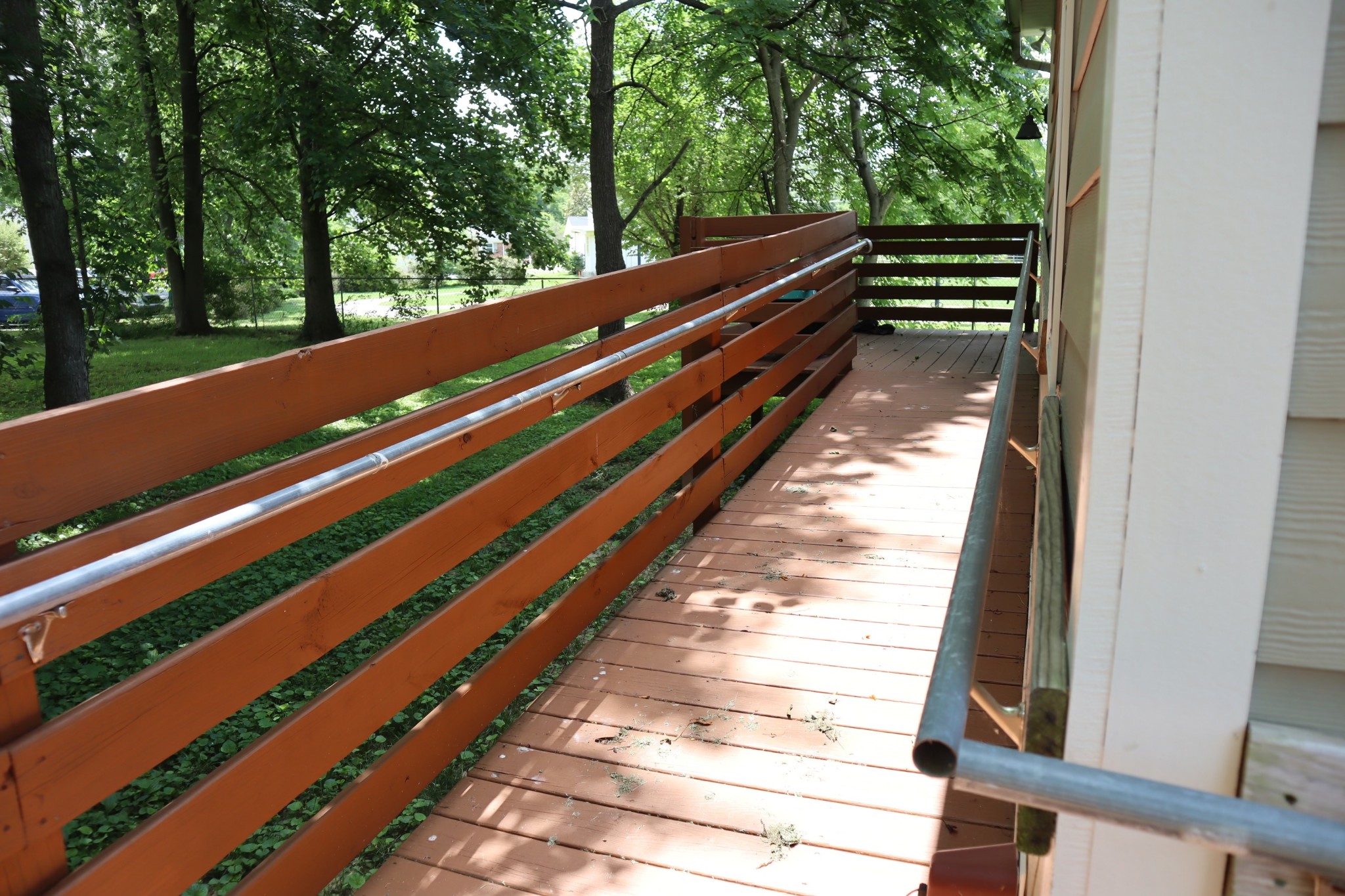 107 February Street Murfreesboro, TN 37129 - Photo 6 of 19 a view of balcony with wooden floor and fence