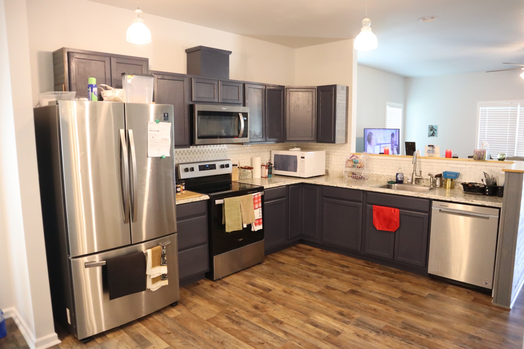 107 February Street Murfreesboro, TN 37129 - Photo 8 of 19 a kitchen with stainless steel appliances a refrigerator a sink and a stove