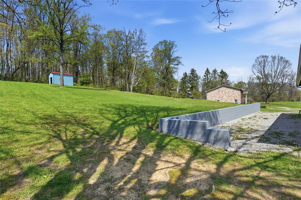 213 Fallen Timber Road Avella, PA 15312 - Photo 30 of 44 The spacious backyard offers the perfect place for children and pets to run, play, and enjoy the outdoors.