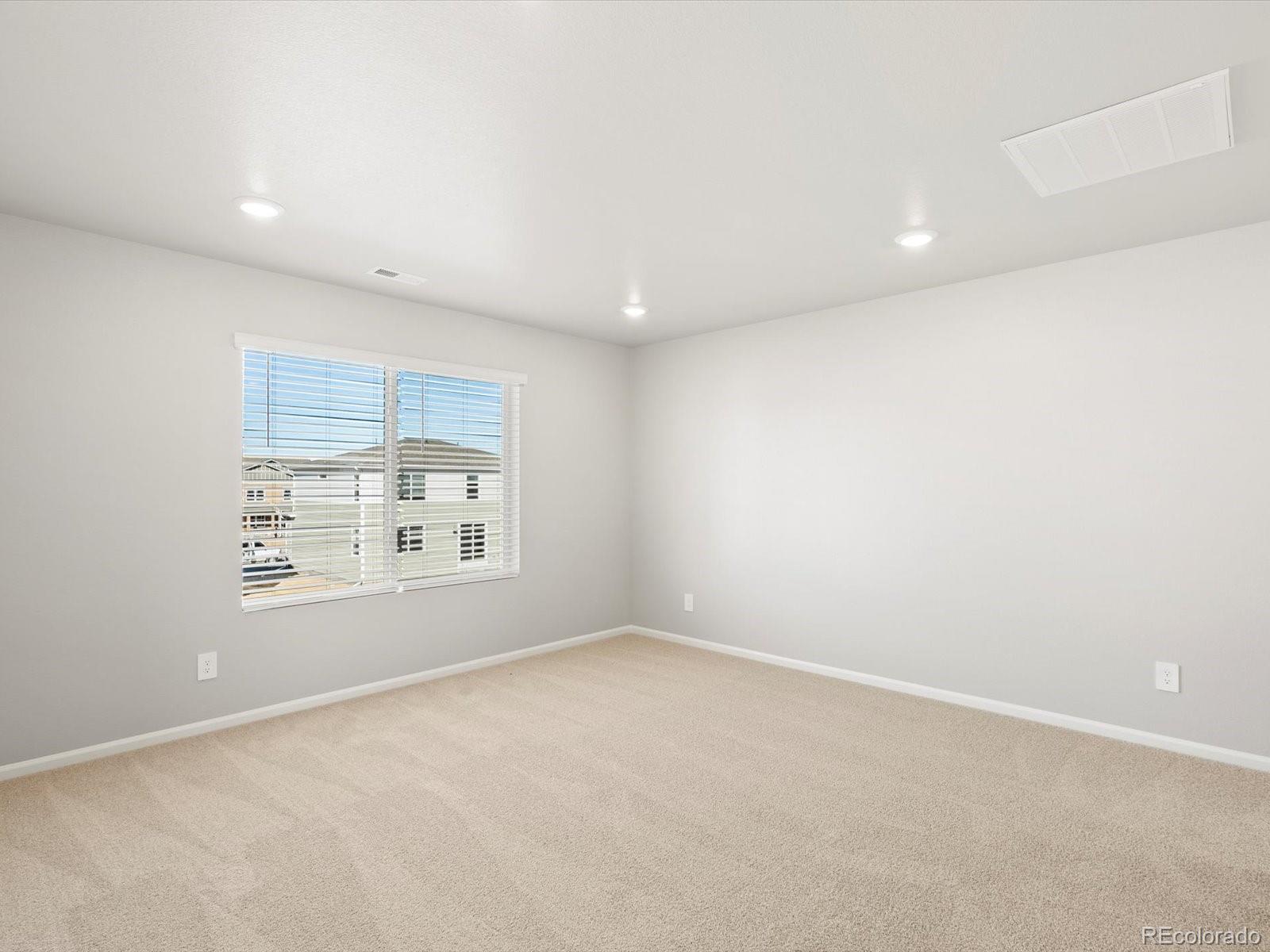 4673 Rabbitbrush Street Johnstown, CO 80534 - Photo 16 of 31 an empty room with a window