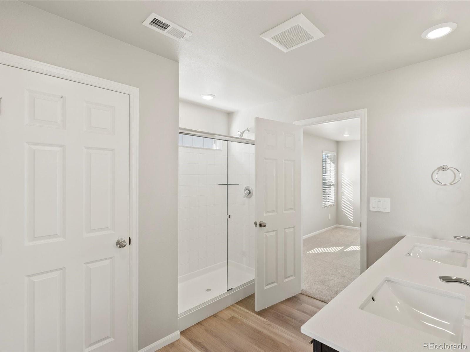 4673 Rabbitbrush Street Johnstown, CO 80534 - Photo 22 of 31 a bathroom with a bathtub and shower