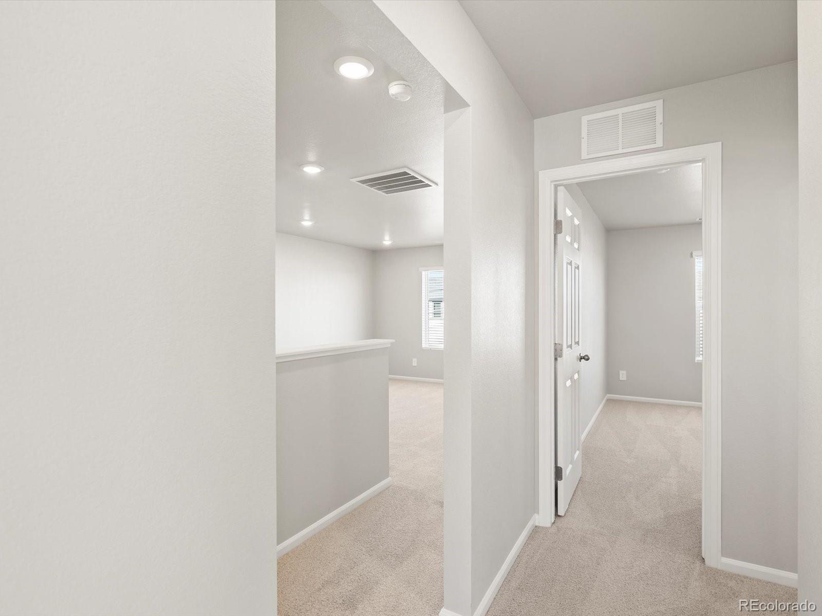 4673 Rabbitbrush Street Johnstown, CO 80534 - Photo 25 of 31 wooden floor in a gallery