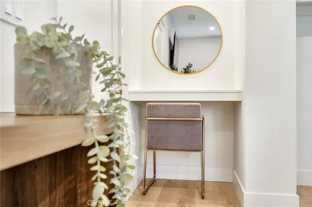 a view of kitchen and dining room with wooden floor