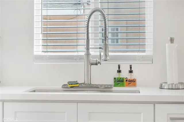a close view of sink and a window
