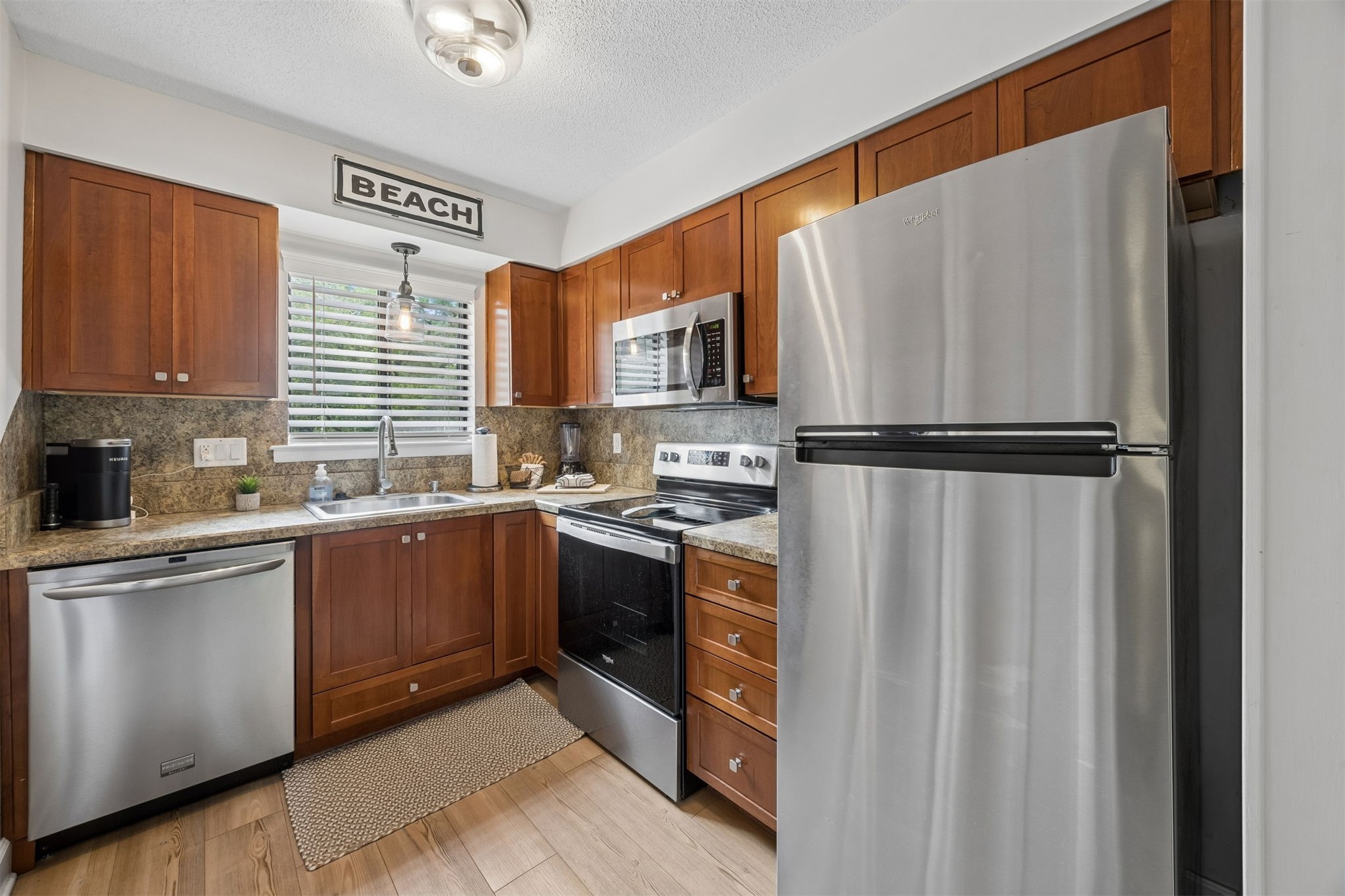 2328 Sadler Road, Unit 2D Fernandina Beach, FL 32034 - Photo 11 of 41 Stainless steel appliances and new kitchen hardware!