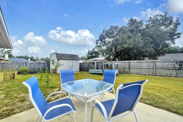 a view of a swimming pool with a lounge chairs