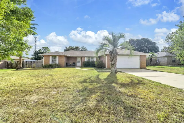 a front view of house with yard