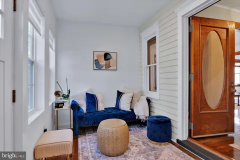 a kitchen with stainless steel appliances white cabinets and a sink