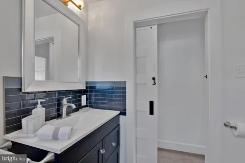 a bathroom with a toilet a sink and a shower