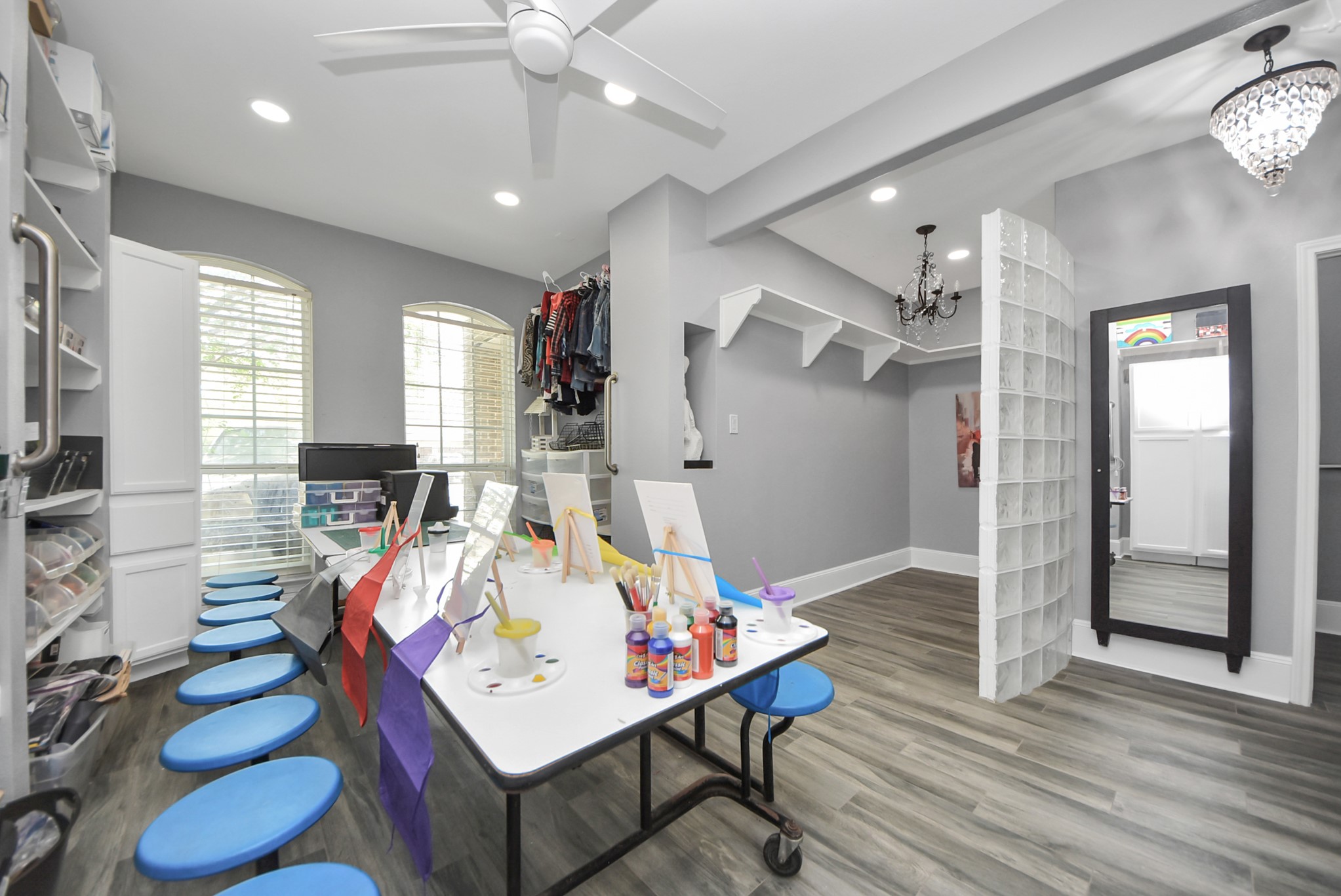 28115 Kudzu Drive Spring, TX 77386 - Photo 26 of 39 a living room with furniture a flat screen tv and a table