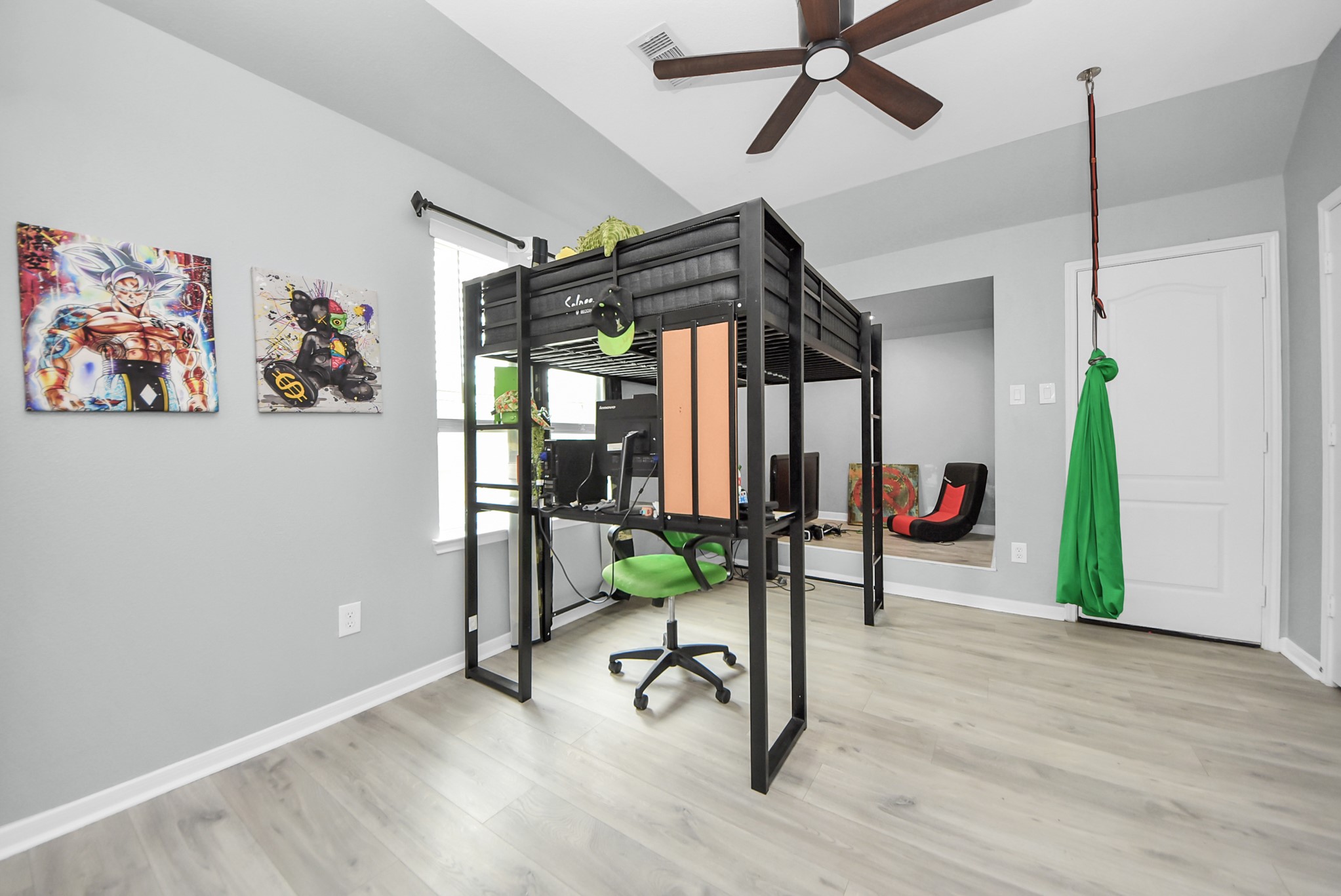 28115 Kudzu Drive Spring, TX 77386 - Photo 30 of 39 a view of a room with gym equipment and a window