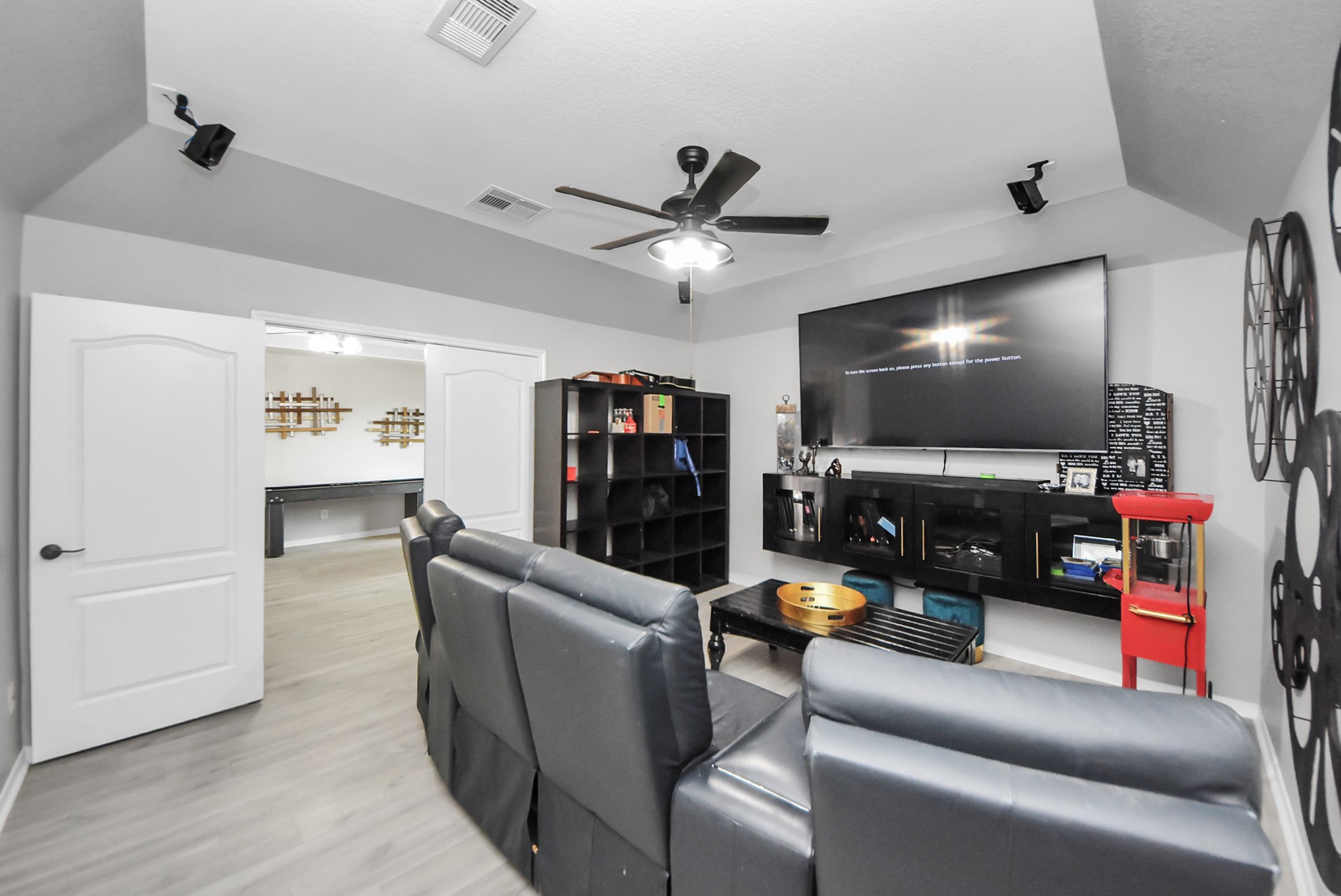 28115 Kudzu Drive Spring, TX 77386 - Photo 35 of 39 a living room with furniture and a flat screen tv