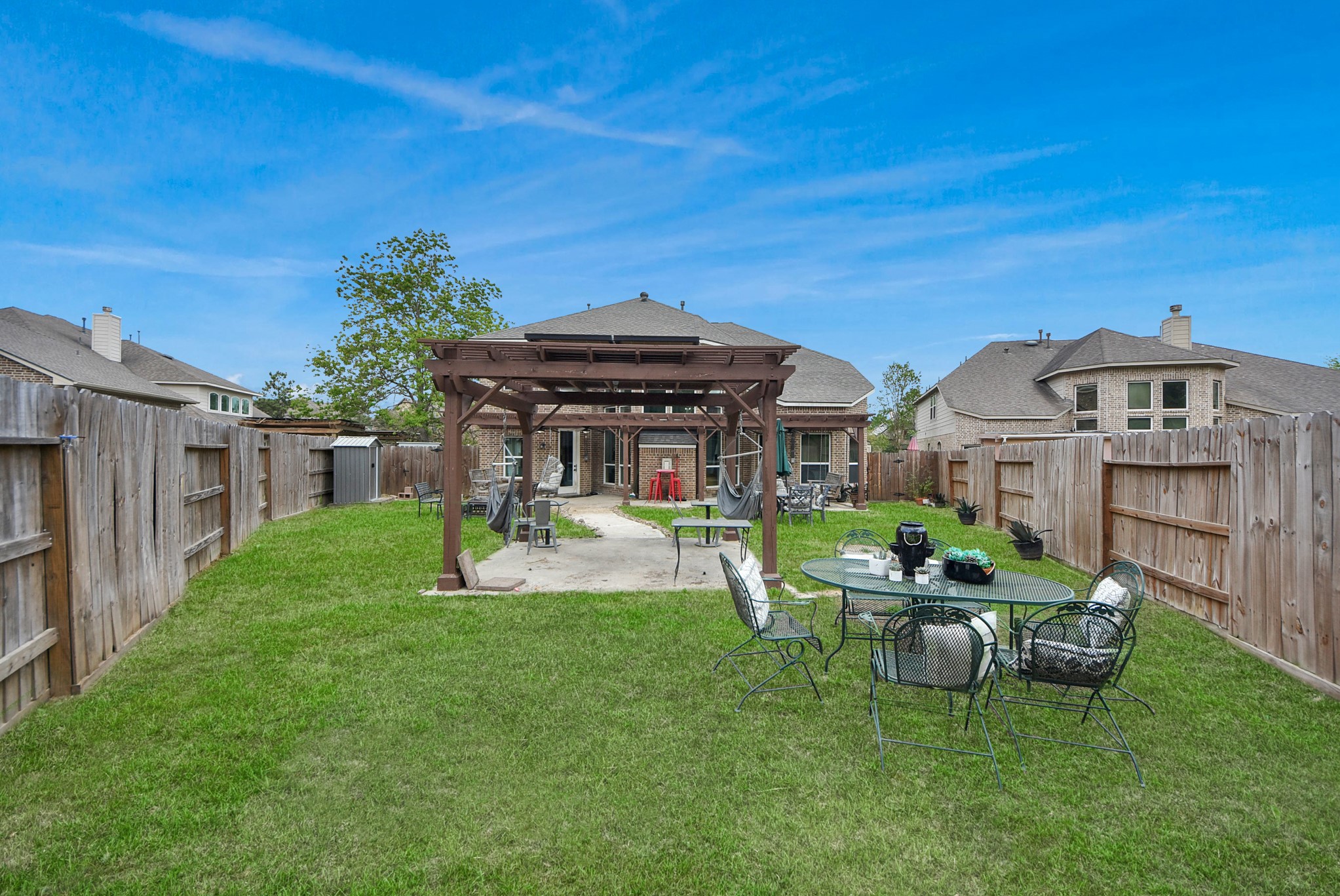 28115 Kudzu Drive Spring, TX 77386 - Photo 37 of 39 a view of a house with a yard porch and sitting area