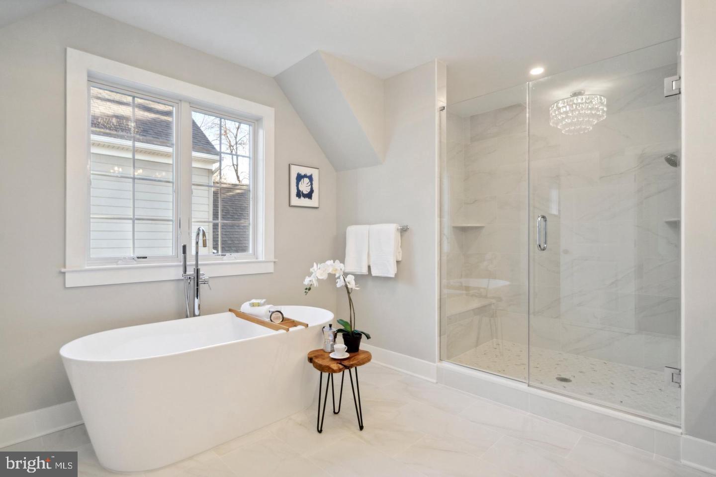 111 St Pauls Road Ardmore, PA 19003 - Photo 11 of 14 a white bath tub sitting next to a bathroom sink