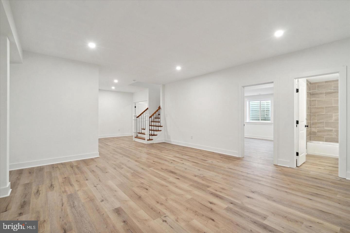 111 St Pauls Road Ardmore, PA 19003 - Photo 12 of 14 a view of an empty room with wooden floor and windows