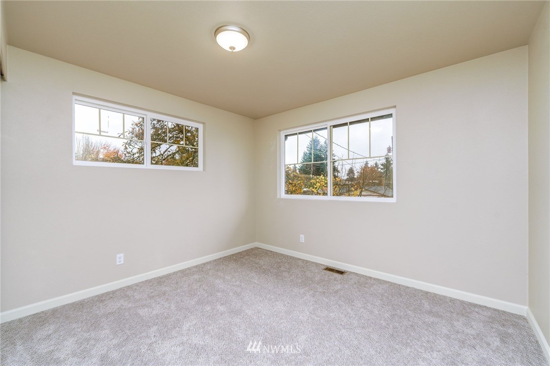 2926 Northeast 5th Place Renton, WA 98056 - Photo 17 of 40 an empty room with windows