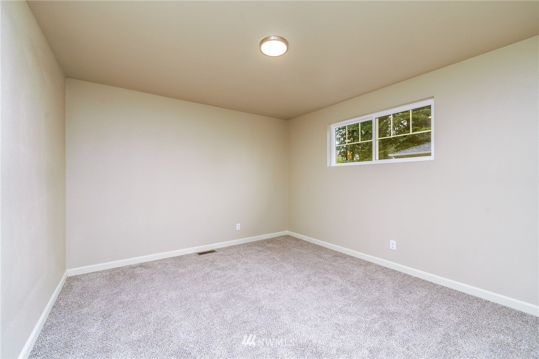 2926 Northeast 5th Place Renton, WA 98056 - Photo 19 of 40 an empty room with a window