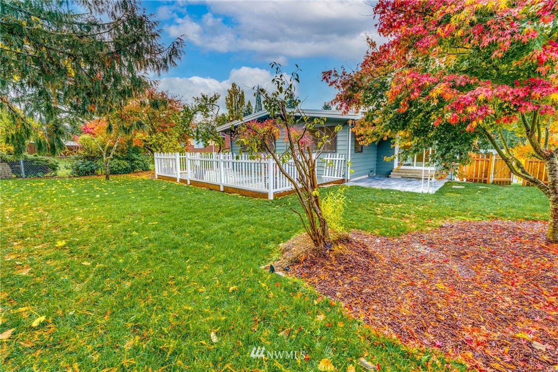 2926 Northeast 5th Place Renton, WA 98056 - Photo 29 of 40 a view of a house with a yard