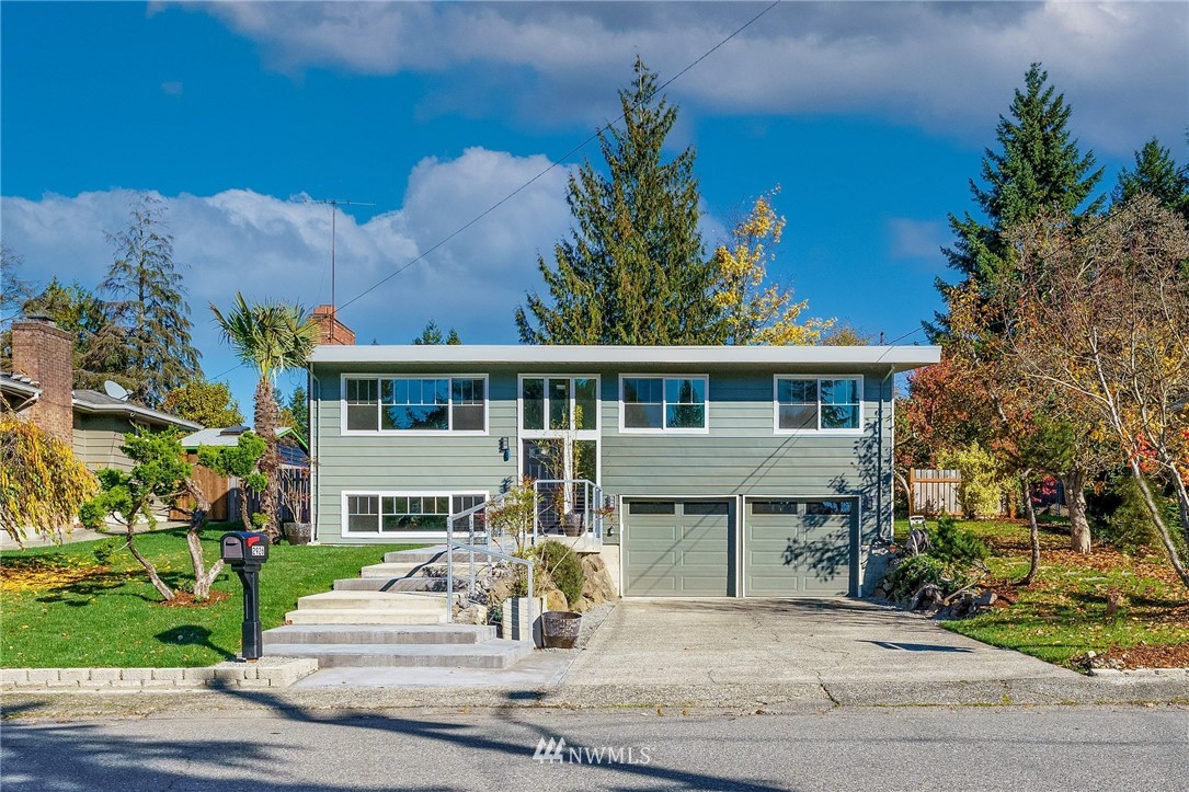 2926 Northeast 5th Place Renton, WA 98056 - Photo 33 of 40 front view of house with a bench