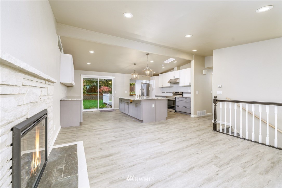 2926 Northeast 5th Place Renton, WA 98056 - Photo 5 of 40 a view of kitchen with furniture and wooden floor